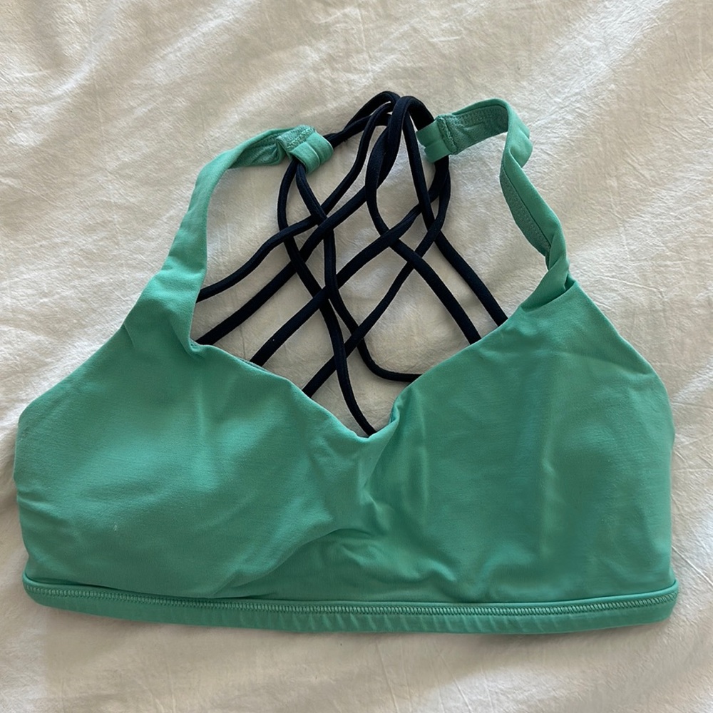 Lululemon free to be wild: aqua/dark blue light impact sports bra size 6